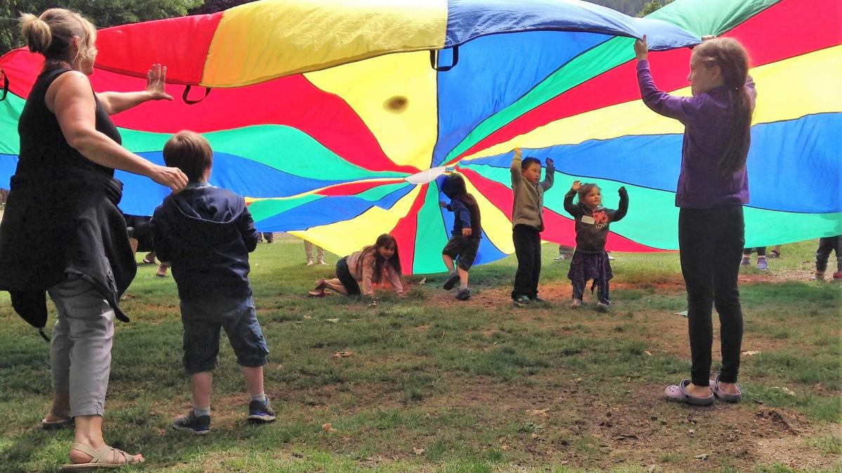 Playing with a parachute